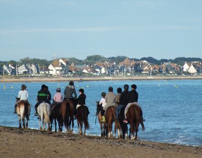 Horse riding on a Normandy beach